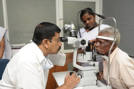 A doctor at Bejan Singh Eye Hospital taking unhurried time over a patient's eye examination